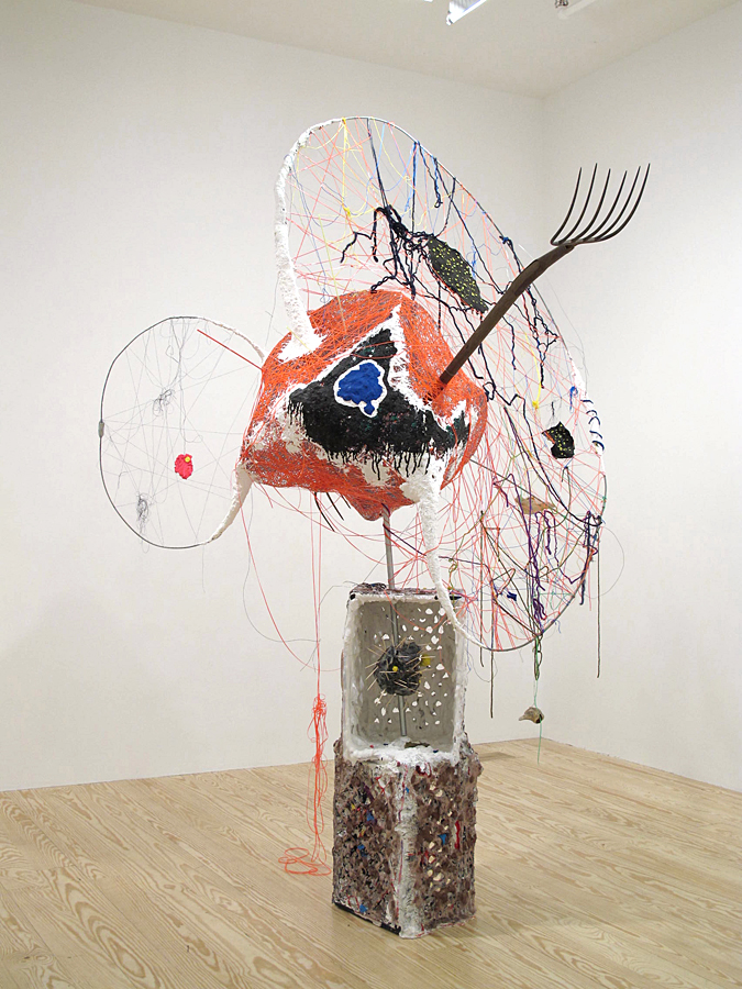 Segre_Collector_900 The Collector, milk crates, plaster, paint, clay, pitchforks, plastacine, rocks, acrylic, paper maché, plastic lace, yarn, thread, wire, toothpicks, seashells. Courtesy of the artist and Derek Eller Gallery