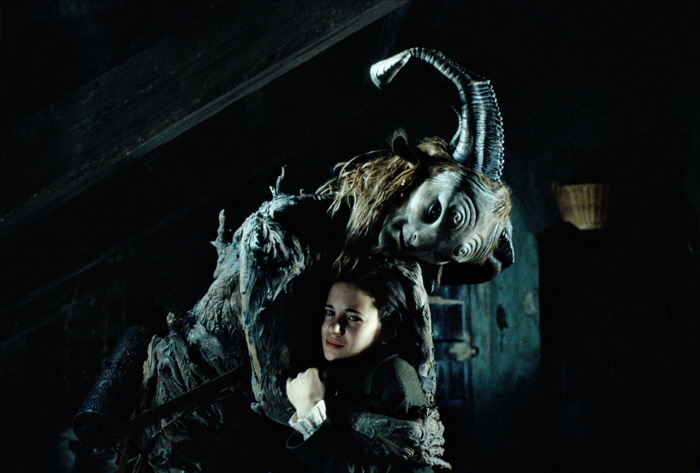 The Faun (Doug Jones) comforts Ofelia (Ivana Baquero) in Pan's Labyrinth