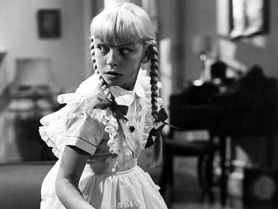 Patty McCormack as THE BAD SEED