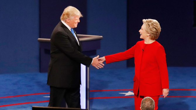 Democratic presidential nominee Hillary Clinton, right, shakes hands with Republican presidential nominee Donald Trump at the start of the presidential debate at Hofstra University in Hempstead, N.Y., Monday, Sept. 26, 2016. (AP Photo/Mary Altaffer)