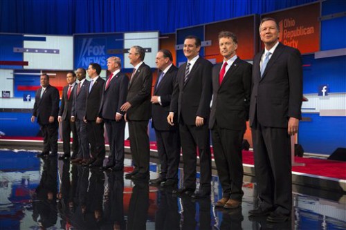 Republican presidential candidates from left, Chris Christie, Marco Rubio, Ben Carson, Scott Walker, Donald Trump, Jeb Bush, Mike Huckabee, Ted Cruz, Rand Paul, and John Kasich take the stage for the first Republican presidential debate at the Quicken Loans Arena Thursday, Aug. 6, 2015, in Cleveland. (AP Photo/John Minchillo)